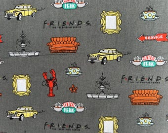 May include: A gray fabric featuring a repeating pattern of Friends television series icons including yellow taxis, orange sofas, Central Perk logos, gold picture frames, fountains, red lobsters, and coffee cups with the text Friends The Television Series.