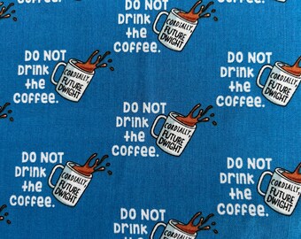 May include: A blue fabric featuring a repeating pattern of white coffee mugs with brown liquid splashing out. Each mug is printed with the text "CORDIALLY, FUTURE DWIGHT" and the surrounding text reads "DO NOT DRINK THE COFFEE." in white.