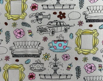 May include: A light gray fabric featuring a repeating pattern of black line drawings including yellow picture frames, a taxi, a tufted sofa, a fountain, a lobster, and a blue polka-dot teacup, interspersed with pink and yellow flowers.