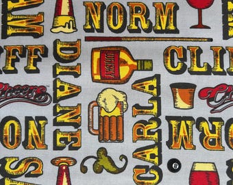 May include: A gray fabric featuring a repeating pattern of Cheers-themed graphics, including beer mugs, wine glasses, pool cues, and billiard balls. The text includes the names Sam, Diane, Norm, Carla, and Cliff, along with the Cheers logo.
