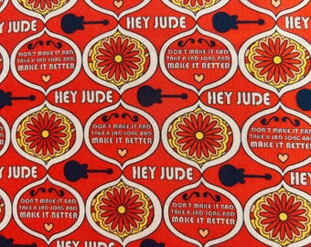 May include: A fabric pattern featuring an orange background with repeating white ovoid shapes. Inside these shapes are red and yellow flower motifs or the text "DON'T MAKE IT BAD TAKE A SAD SONG AND MAKE IT BETTER" with a small heart. Dark blue guitar silhouettes and the text "HEY JUDE" are interspersed throughout.