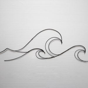 Beautiful wire wave, wire sea, wire wall decoration, nature decoration, wire silhouette, ocean, interior decoration