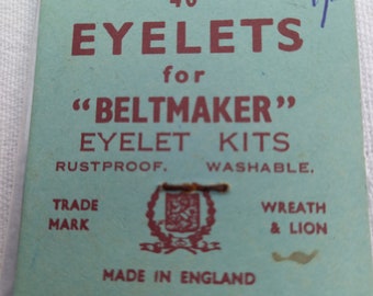 Unopened vintage pack of forty eyelets for "Beltmaker" eyelet kit. Wreath & Lion trade mark. Rustproof. Washable. Made in England. Pre-1971.