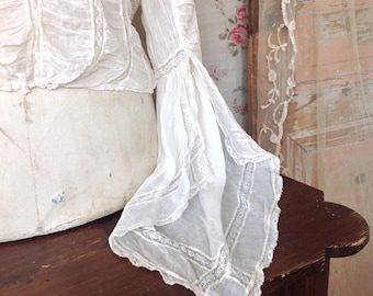 antique blouse with amazing sleeves probably 1850s
