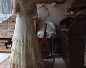 antique wedding dress, with pink ribbons 1890s