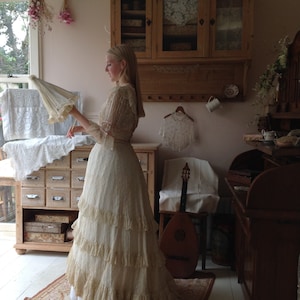 antique wedding dress, with pink ribbons 1890s
