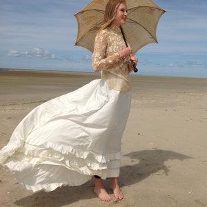cream white bustle skirt from 1880s