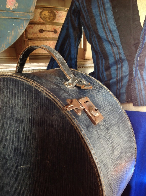 blue hat box, hat suitcase,