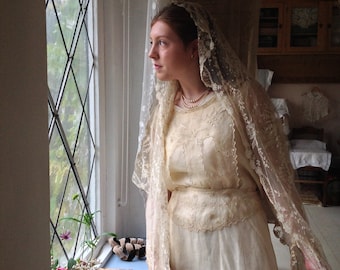 antique wedding dress with tiny detailed embroidery work 1880s