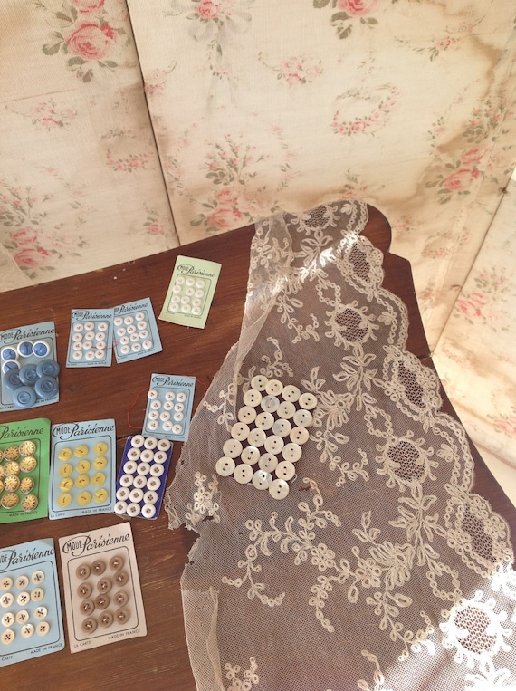 lot of antique buttons in bright colors