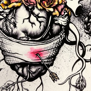 Detail of arrow penetrating bandage and heart of Frida Kahlo