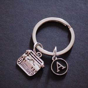 Máquina de escrever esmalte preto chave inicial escritor autor chaveiro chaveiro giftgift