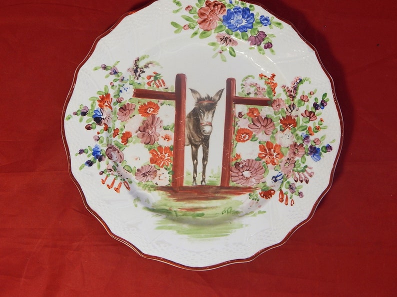 Another Donkey looking through a gateway Hand painted on an antique Staffordshire plate.