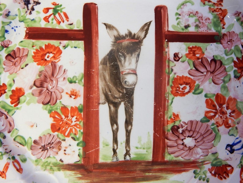 Another Donkey looking through a gateway Hand painted on an antique Staffordshire plate.