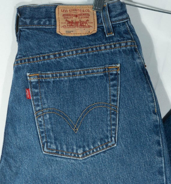Vintage Levi s Jeans 550 languette rouge delave bleu moyen denim de coton hanches coupe ronde VTG femme taille 12 court 30 taille x 29 entrejambe Etsy France