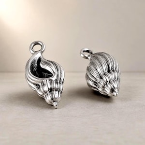 Antieke zilveren hanger in de vorm van een schelp - Benodigdheden voor het maken van sieraden, 2 stuks