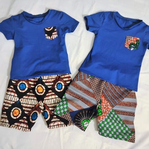 Completo pantaloncini e maglietta cerata da 3 mesi a 3 anni
