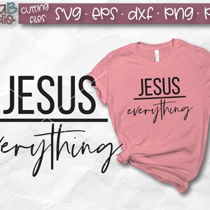 May include: A pink t-shirt with the text "JESUS everything" in black lettering. The text is separated by a horizontal line.