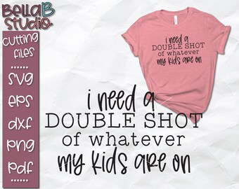 May include: A pink t-shirt with the text "i need a DOUBLE SHOT of whatever my kids are on" printed in black.