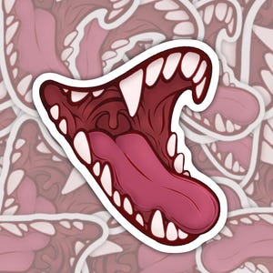 May include: A sticker featuring a cartoon illustration of a wide open mouth with sharp teeth and a pink tongue. The mouth is outlined in white and has a red and pink color scheme.