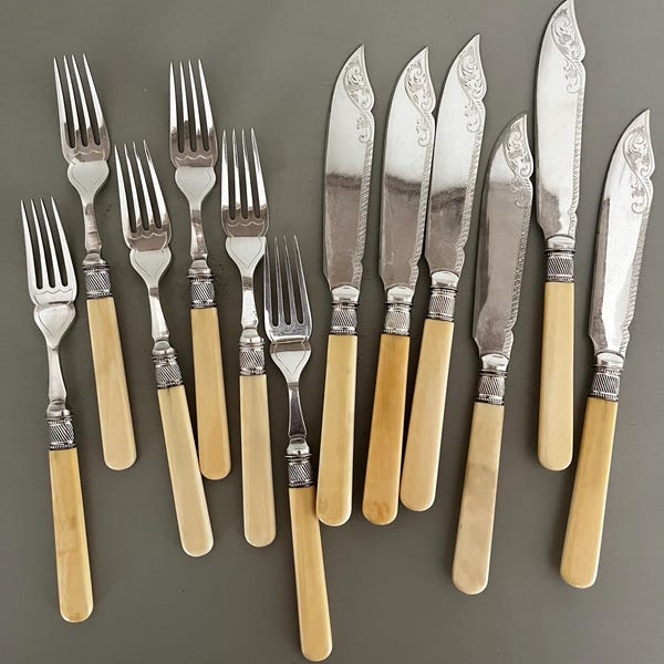 Vintage Forks/Knives (8 each) White Bakelite Handle with Scroll Design