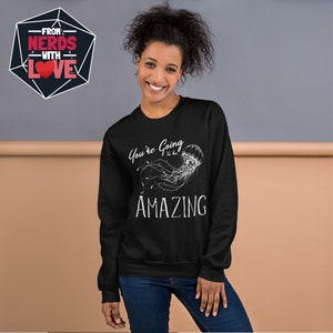 May include: Black sweatshirt with a white graphic of a jellyfish and the text "You're Going to be Amazing".