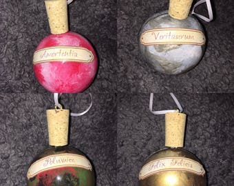 Set of four potion bottle ornaments