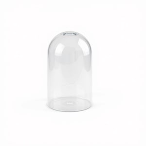 May include: A clear glass cloche with a smooth, cylindrical body and a rounded, dome-shaped top. The glass cover features a small, circular opening at the very peak of the dome, providing a transparent and hollow structure for display purposes.