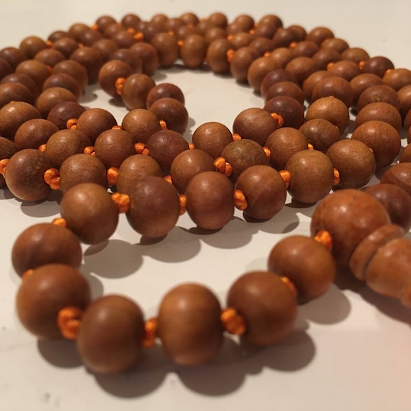 sandalwood 108 bead hand knotted mala necklace