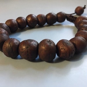 Men's Mala bracelet. Bodichitta Bodhi seeds on nylon and an adjustable knot