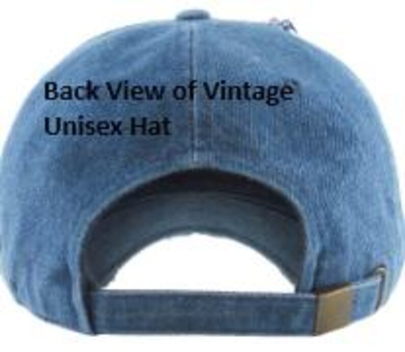 May include: Back view of a blue denim unisex hat with a curved brim and adjustable strap. The hat features the text "Back View of Vintage Unisex Hat". The strap has a brass-colored metal buckle.