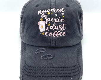 Powered by Pixie Dust and Coffee-Ponytail or Unisex Hats