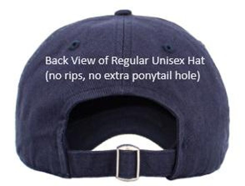 May include: Back view of a navy blue unisex hat with an adjustable metal buckle closure. The text "Back View of Regular Unisex Hat (no rips, no extra ponytail hole)" is visible on the image.