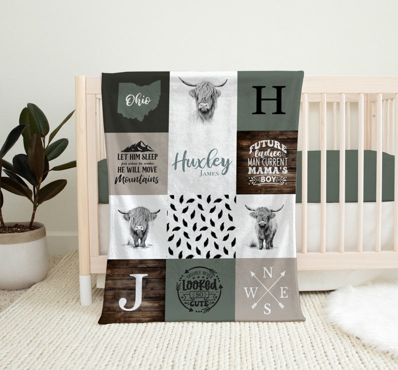 May include: A patchwork baby blanket with various square designs. The blanket features images of a Highland cow, the Ohio state outline, and text including "Huxley James", "Let Him Sleep He Will Move Mountains", and "Future Ladies Man Current Mama's Boy".