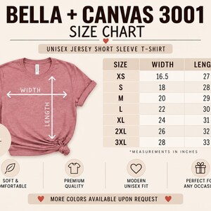 Op de afbeelding: Een Bella + Canvas 3001 unisex jersey t-shirt met korte mouwen in mauve melange met een maattabel die breedte- en lengtematen in inches toont voor de maten XS tot 3XL. De afbeelding bevat tekstlabels voor breedte en lengte.