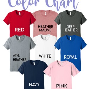 Puede incluir: Carta de colores que muestra diferentes colores de camisetas, incluyendo rojo, malva jaspeado, gris jaspeado oscuro, gris jaspeado deportivo, blanco, azul real, azul marino y rosa.