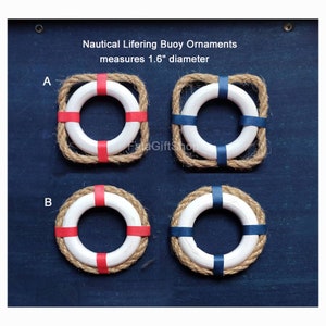 May include: Four nautical life ring buoy ornaments with rope trim. Two have red and white stripes and two have blue and white stripes. Each life ring measures 1.6 inches in diameter.  Nautical Lifering Buoy Ornaments measures 1.6" diameter