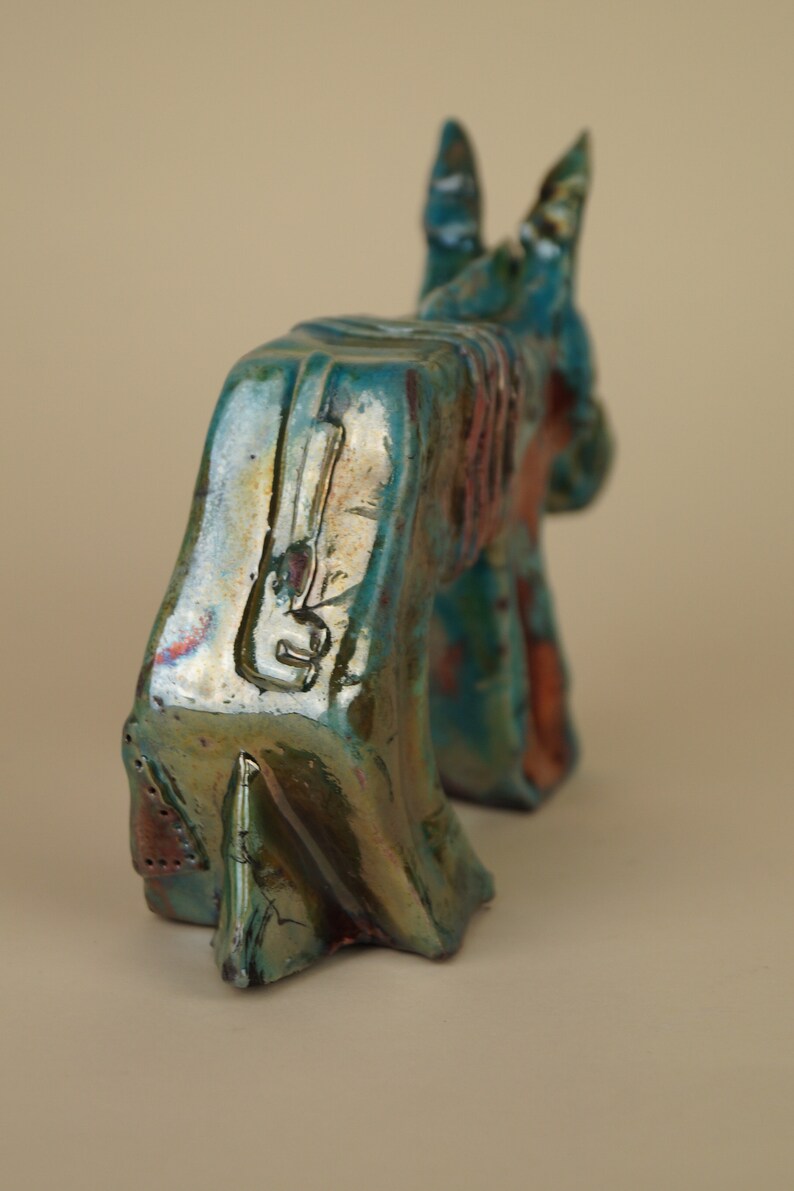 Ceramic donkey figurine fired in raku