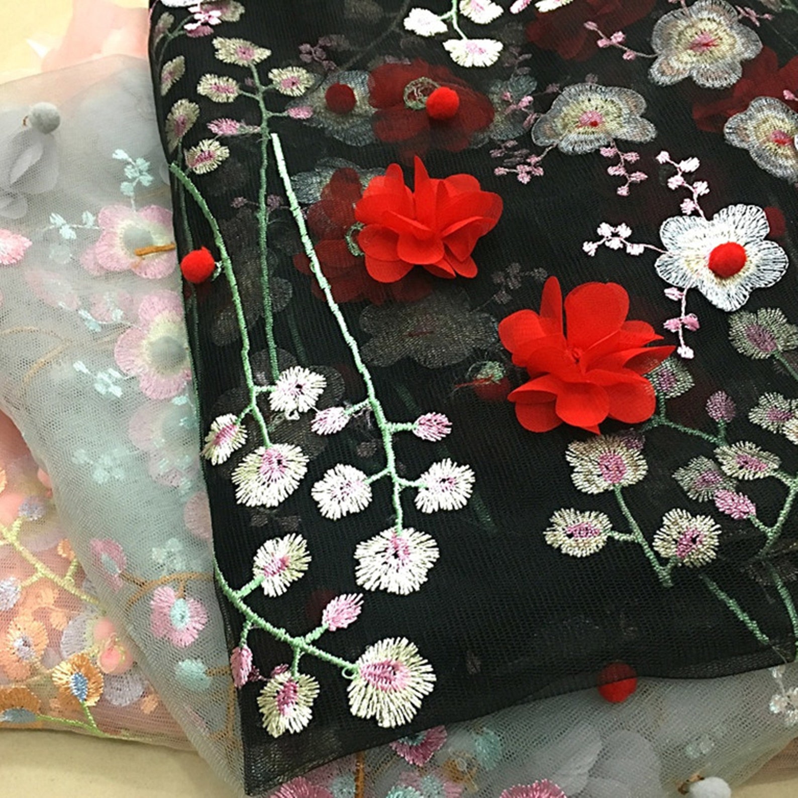 Vibrant 3D Embroidered Floral Cord Lace with Layered Texture and Open Mesh Design