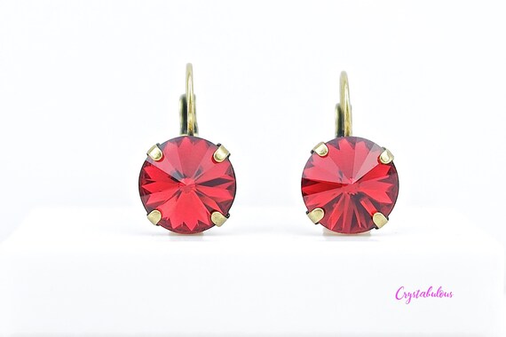 Red crystal dangle best sale earrings