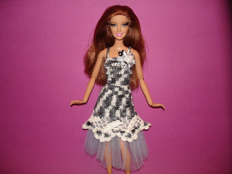 barbie doll height in cm
