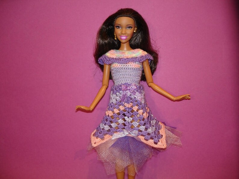 barbie doll height in cm