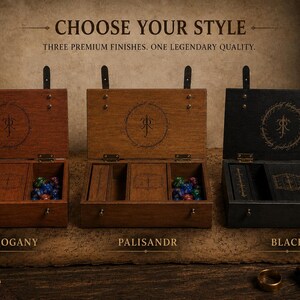 May include: Three rectangular wooden boxes with hinged lids, labelled Mahogany, Palisandr, and Black. Each box features an interior divider, a laser-engraved circular symbol on the lid, and a collection of multi-coloured dice. Text reads: CHOOSE YOUR STYLE. THREE PREMIUM FINISHES. ONE LEGENDARY QUALITY.