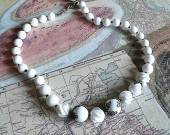 Old white pearl choker necklace