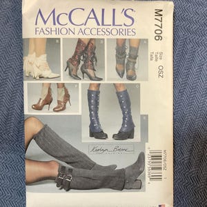 May include: McCall's Fashion Accessories sewing pattern M7706 size OSZ for boot cuffs. The pattern includes instructions for making five different styles of boot cuffs, including a pair of tall, striped boot cuffs with buckles.