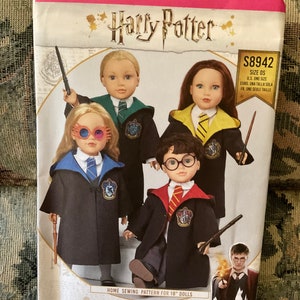 May include: A Simplicity sewing pattern for making Harry Potter themed outfits for 18 inch dolls. The pattern includes four different outfits, each representing a different Hogwarts house: Gryffindor, Slytherin, Hufflepuff, and Ravenclaw. The pattern is labeled with the number S8942 and includes instructions for making the outfits.