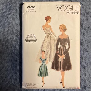 May include: Vogue Patterns sewing pattern for dresses. The pattern features illustrations of three different dress designs. The pattern is a reissue of a 1959 design and includes sizes US (16-18-20-22-24). The pattern is labeled "Authentic".