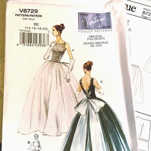 May include: Vintage Vogue sewing pattern for a dress with a full skirt. The pattern is for sizes 14-16-18-20 and is from 1956. The pattern includes two different styles of dresses, one with a white skirt and a black bodice and the other with a black skirt and a white bodice.