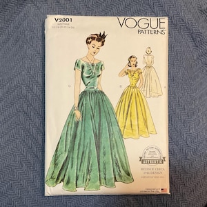 May include: Vogue Patterns sewing pattern, V2001, featuring illustrations of vintage dresses. The cover shows a green gown and a yellow gown, with the text "AUTHENTIC REISSUE CIRCA 1941 DESIGN". The pattern size is YS (18-20-22-24-26).