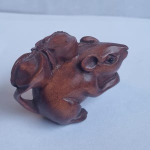 Vintage finely detailed hand-carved boxwood mouse carrying harvest netsuke intricate design representing harvest and wealth.signed to base